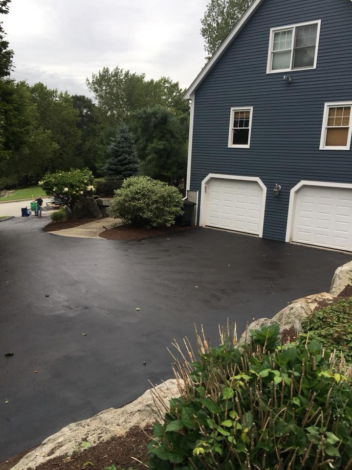 After fresh seal coat on long driveway