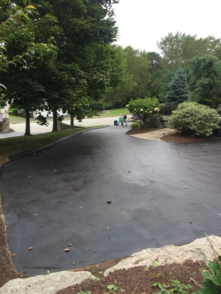 After fresh seal coat on long driveway